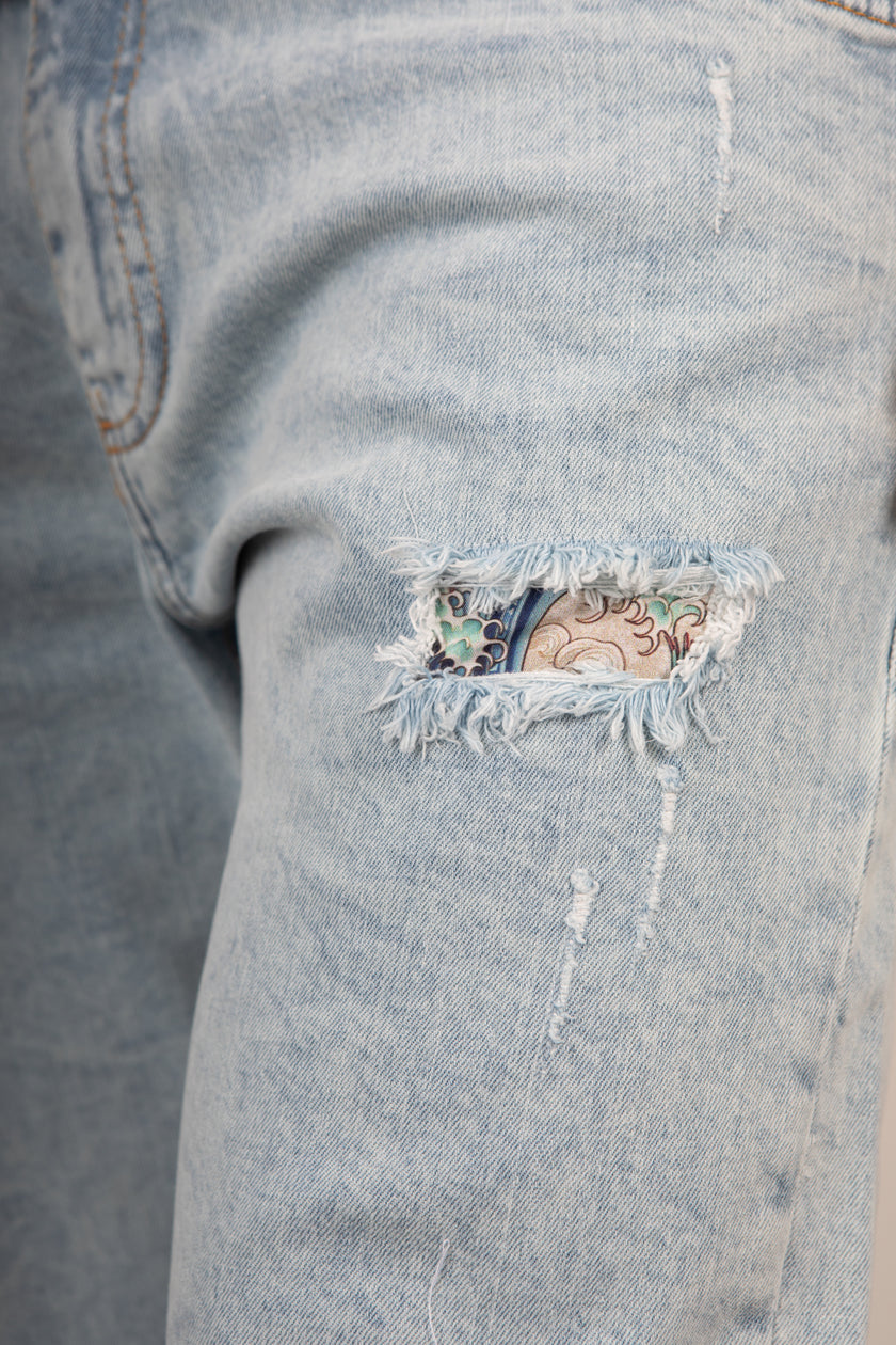 Jeans con patch V2 - JUMRMX